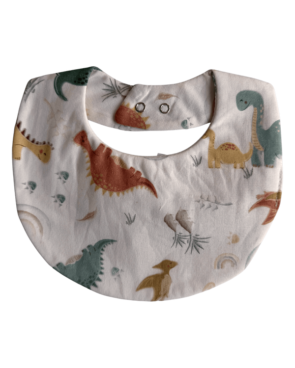 Babete redondo creme com dinossauros estampados
